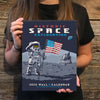 Woman holding space exploration calendar