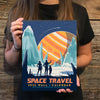 Woman holding our space travel calendar